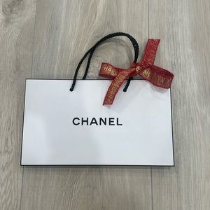 CHANEL shopping bag & Christmas ribbon. 9.5x5.5 inches.
